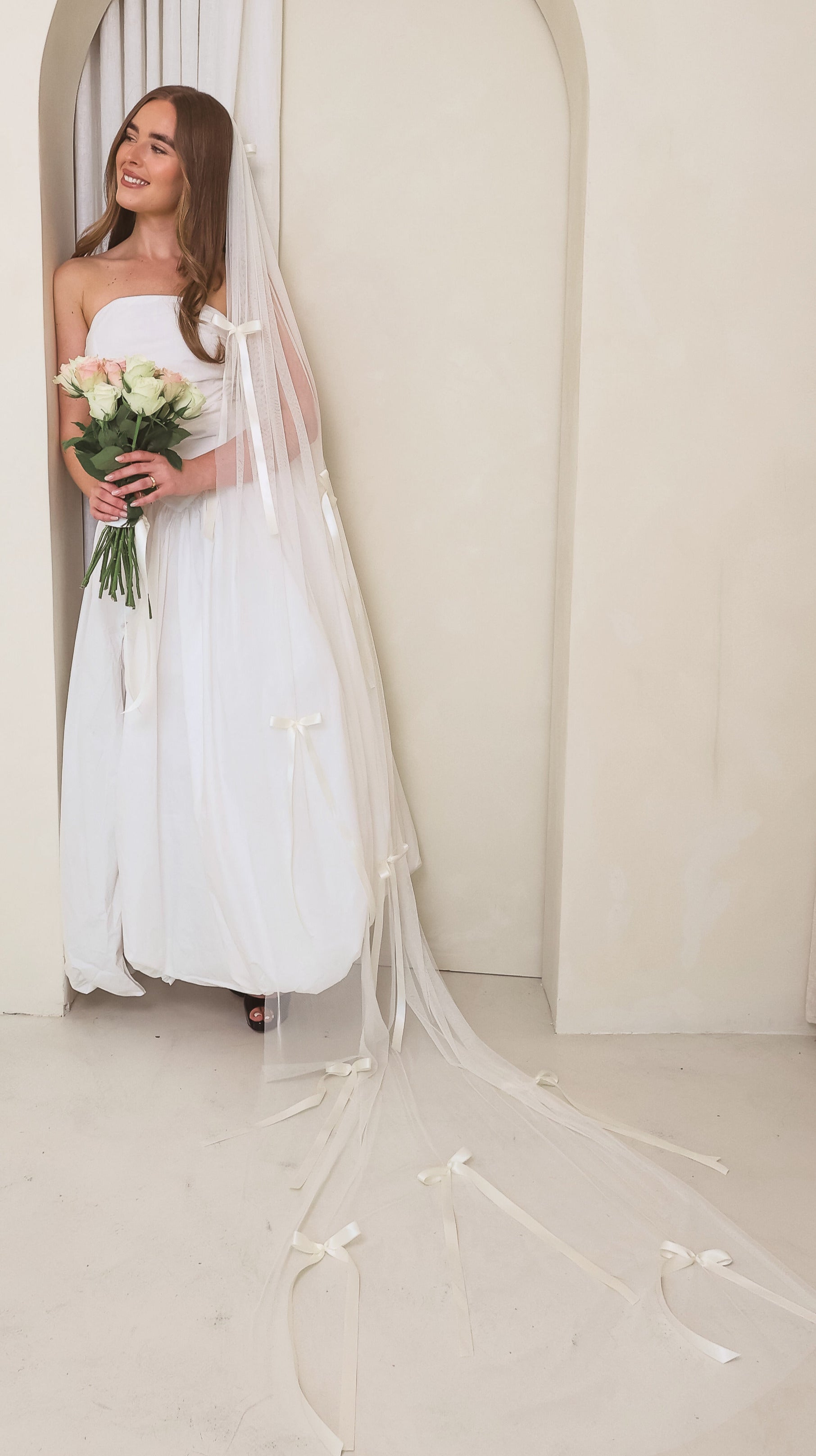 The cascading Ivory Ribbon Veil