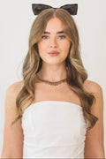 The detachable ribbon bow veil